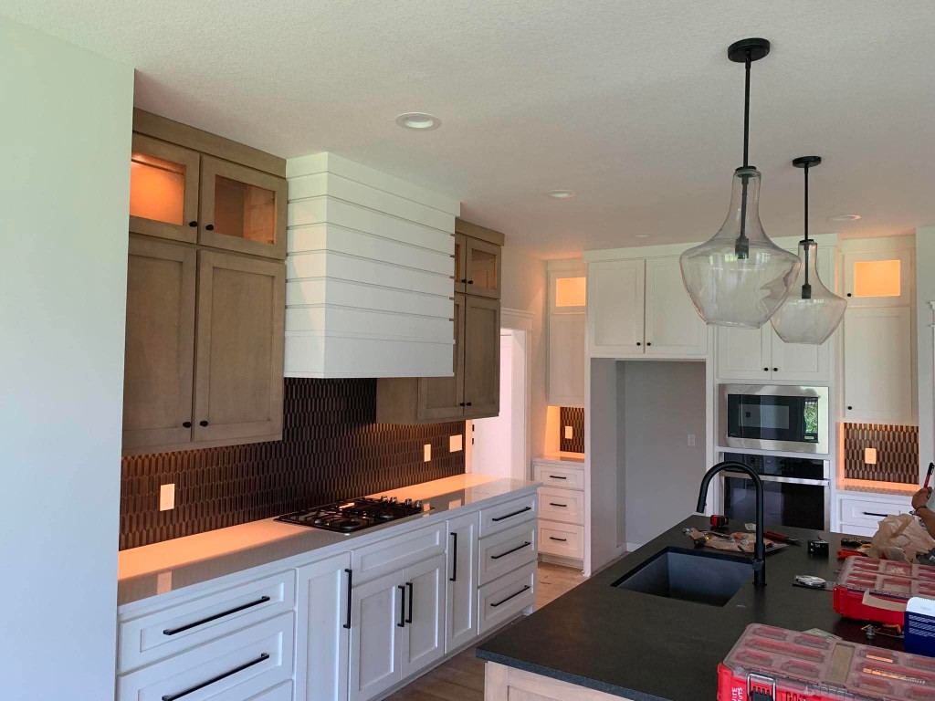 Modern kitchen electrical and lighting work completed by Prestige Electric in a Kansas City home